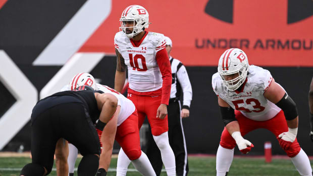 Feb 25, 2023; Las Vegas, NV, USA; D.C. Defenders quarterback Jordan Ta'amu (10) lines up behind the offensive line against the Vegas Vipers in the first quarter at Cashman Field. Mandatory Credit: Candice Ward-USA TODAY Sports